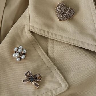 Broche strik taupe