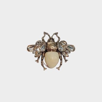 Broche vlieg beige