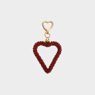 Gouden tas of sleutelhanger met bordeaux hart van glaskraaltjes lengte 13 cm