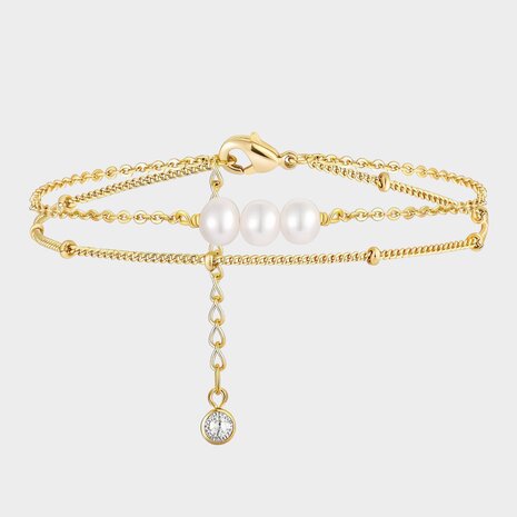 Set van twee gouden armbanden met witte parel en steentje stainless steel