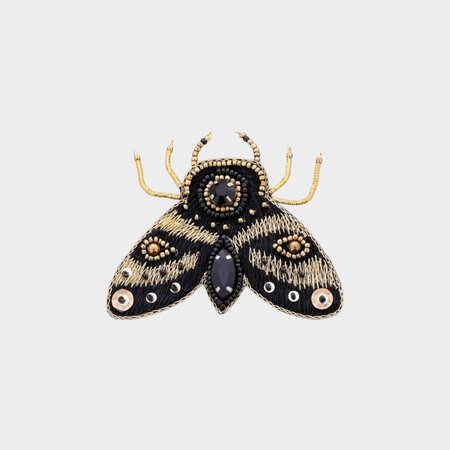Broche mot zwart